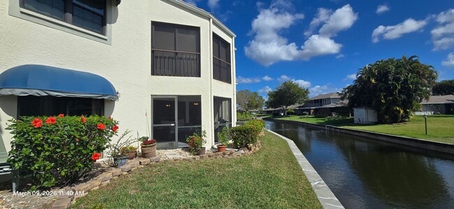 Building Photo - Welcome to **Caloosa Yacht & Racquet Club**, one of Fort Myers’ most charming **gated waterfront ...