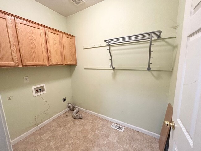 Building Photo - Stunning Remodeled Home with Office, A/C, Fenced Yard & Flexible Living Space!