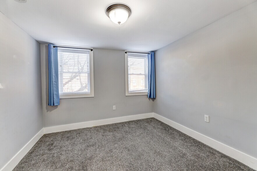 Second floor bedroom. - 60 S Carrollton Ave