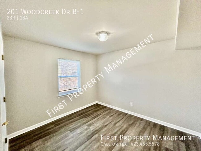 Building Photo - 201 Woodcreek Dr