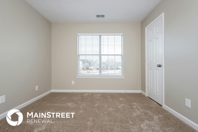 Building Photo - 6584 Planters Ct