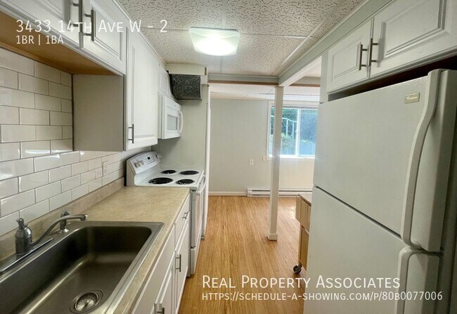 Building Photo - 3433 14th Ave W