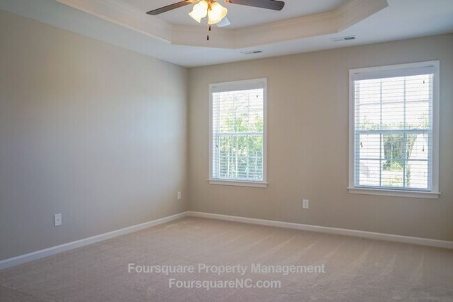 Building Photo - Modern 3-Story Townhome with Entry-Level Bonus Room, Back Deck & Garage , Community Pool in North...
