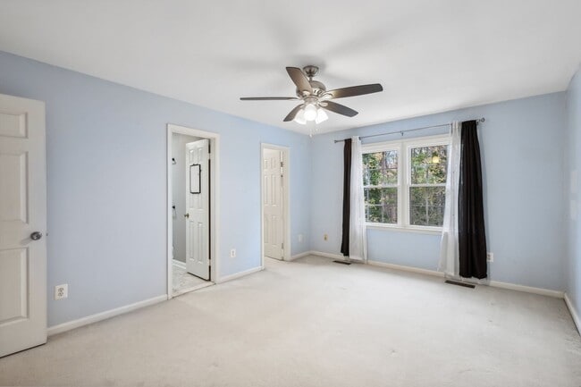 Building Photo - Modern Brick End-Unit Townhome with Stunning Upgrades and Serene Wooded Views