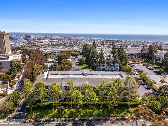 Building Photo - Available now! Updated Versailles Condo in Newport Beach