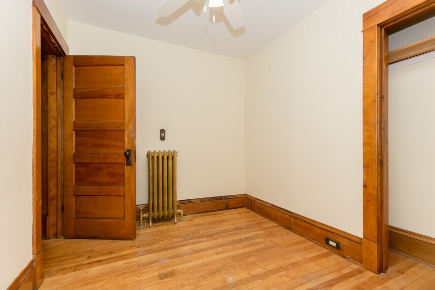 Bedroom #1 main floor with ceiling fan - 715 5th St SE