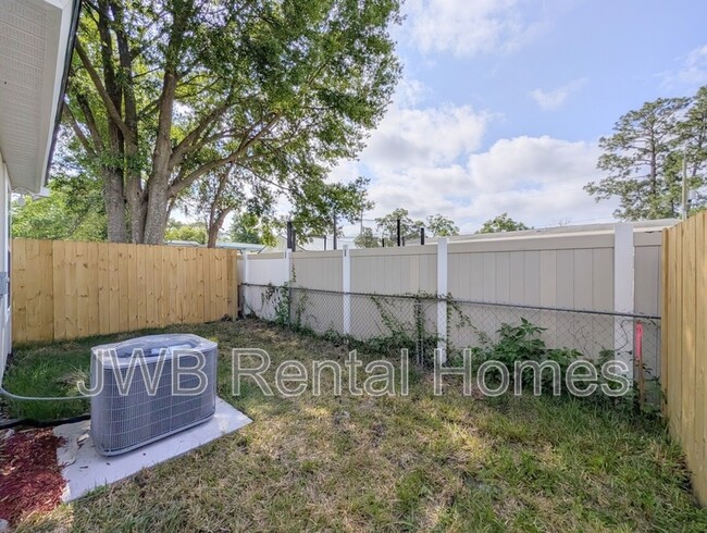 Building Photo - 7630 Cocoa Ave