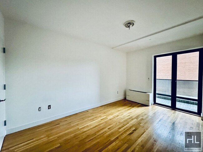 Building Photo - large rent stabilized one bedroom with pri...