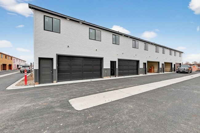 Building Photo - $300 off first month for February move-ins - BRAND NEW 3 BED 2.5 BATH TOWNHOMES WITH 2 CAR GARAGE