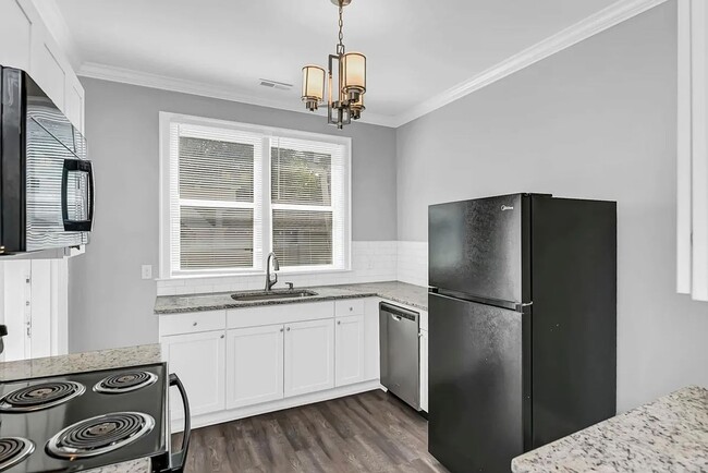 Building Photo - Beautifully renovated and repurposed house