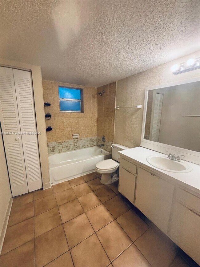 Building Photo - 301 Gardens Dr