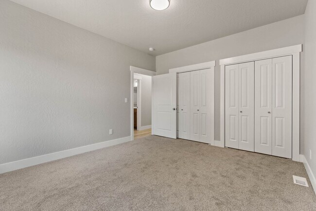 Building Photo - Newly built 4 Bedroom Duplex With Garage