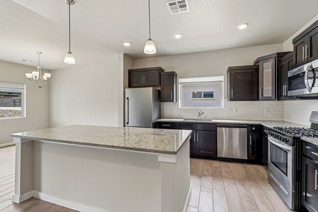 Building Photo - 14740 Mike a Mendoza Ave