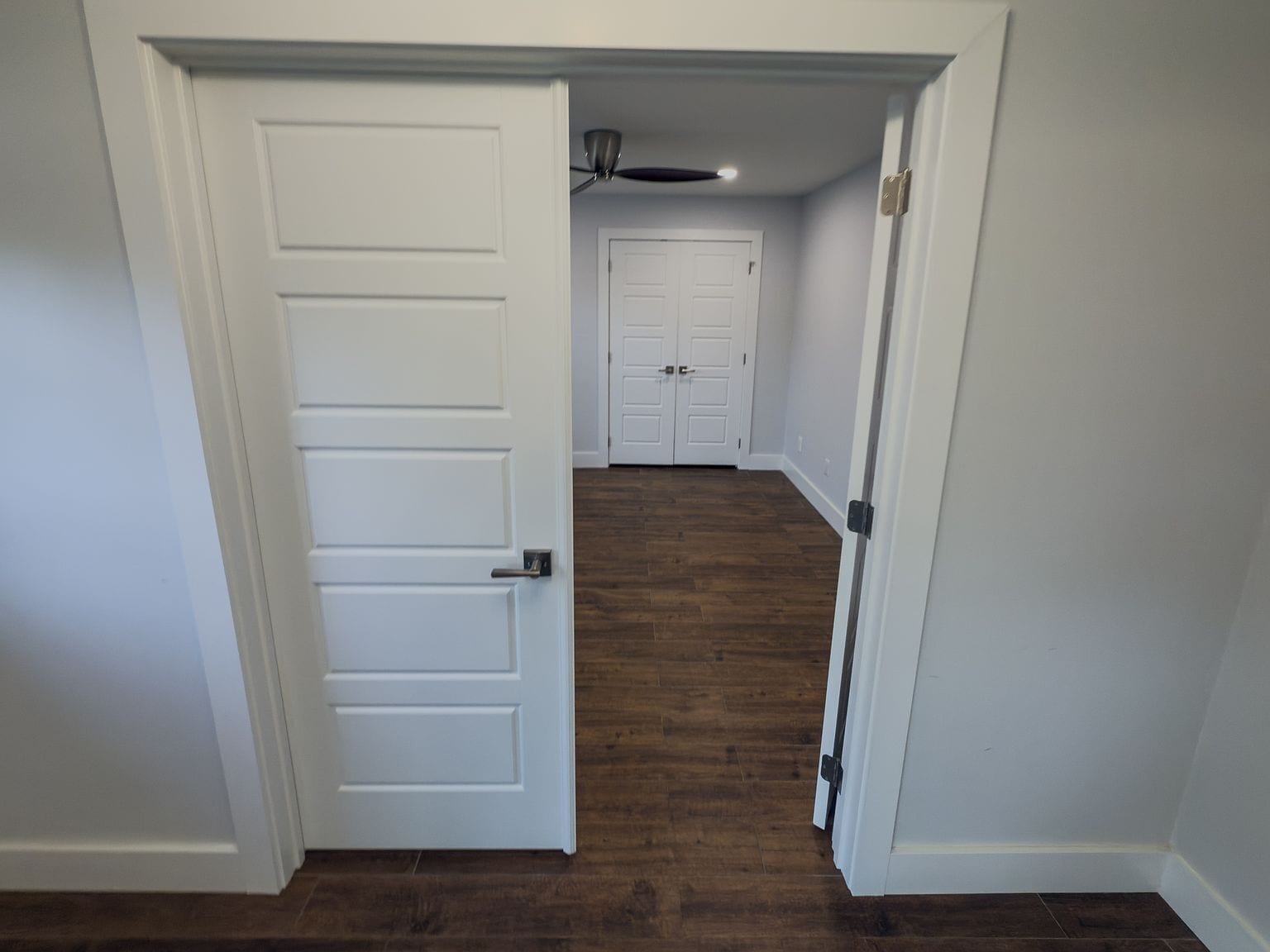 Bedroom doorway showing closet and ceiling fan - 2006 Candle Ct