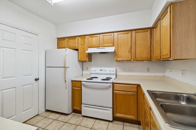 Building Photo - Spacious 1-Bedroom Condo for Annual Rent available now in gated Villagio Community