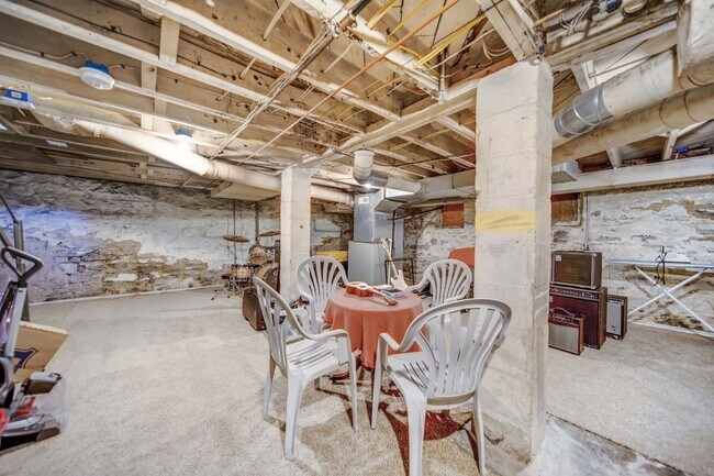 Building Photo - Charming 5-Bedroom Home with Exposed Brick and Modern Upgrades