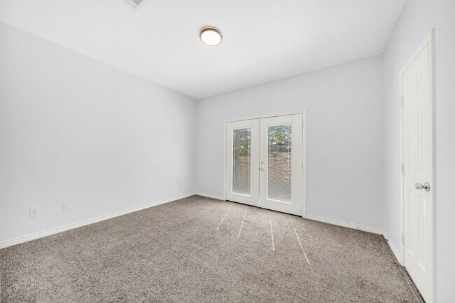 Building Photo - Welcome to this charming Craftsman-style residence nestled in the serene community of Lake Conroe...