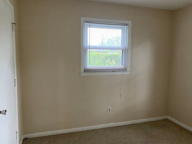 Building Photo - COMING SOON! 4Br, 2.5 baths, large kitchen, large bedrooms, fence, storage and more! N. College R...