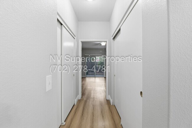 Building Photo - SW!!! 2 Bedroom Condo 1st Floor!! 2 Garage!! Gated!! Community Pool!! Fitness Room!! 2 Primary Be...