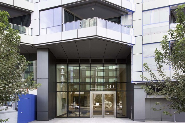 Building Photo - Stunning LUMINA Condo with Bay Views