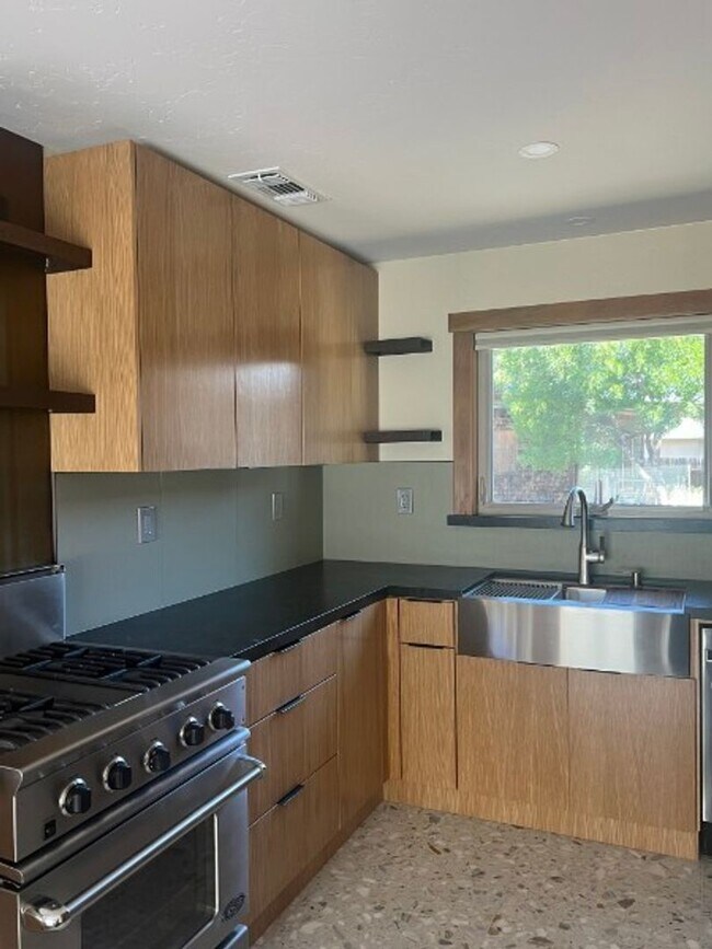 Building Photo - Artisan-Built Custom Cottage Retreat | Private Yard, Garage & EV Charging Ready