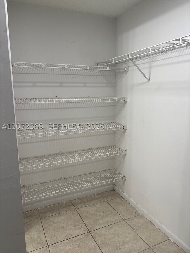 Building Photo - 4675 W 18th Ct