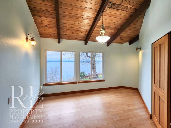 Building Photo - MOVE-IN SPECIAL: 50% OFF FIRST MONTHS RENT - Waterfront Rustic Retreat with Vaulted Ceilings, Pic...