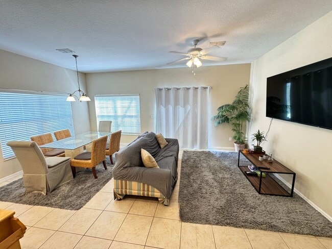 Building Photo - Fully Furnished 5-Bed End-Unit Townhome with Hot Tub in Gated Coral Cay! WASHER & DRYER INCLUDED!