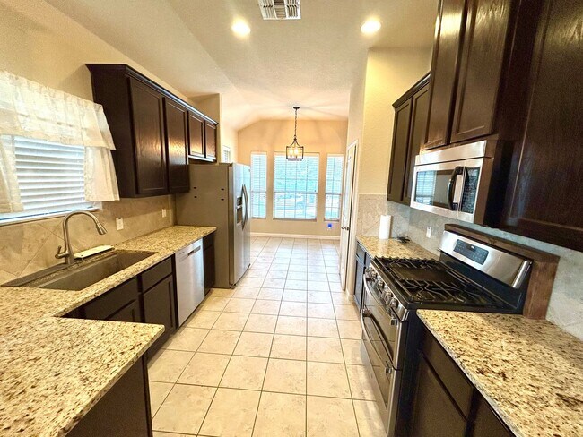 Building Photo - Modern Home with Fenced Backyard, Community Pool & Playground!