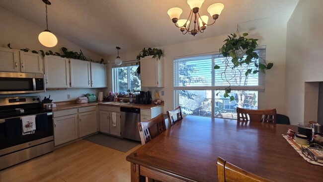 Building Photo - Fantastic 4BR, 3.5BA! Deck, FP, great yard, location!! (Regal)