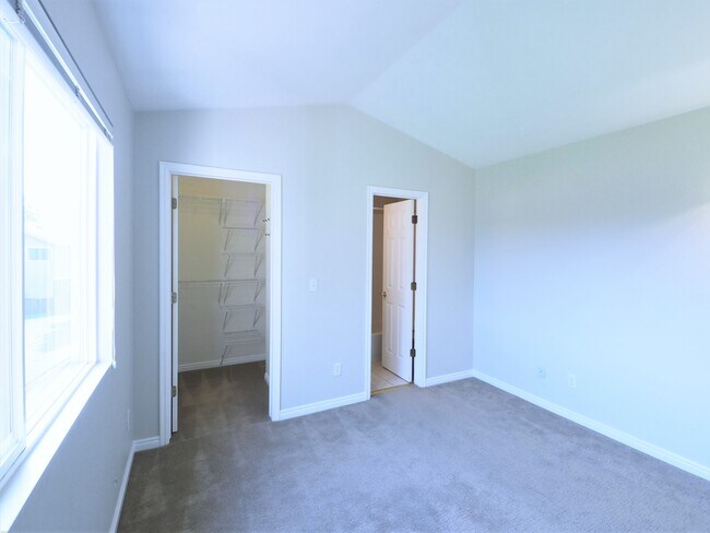 Bedroom with walk in closet - 1233 Warrior Way