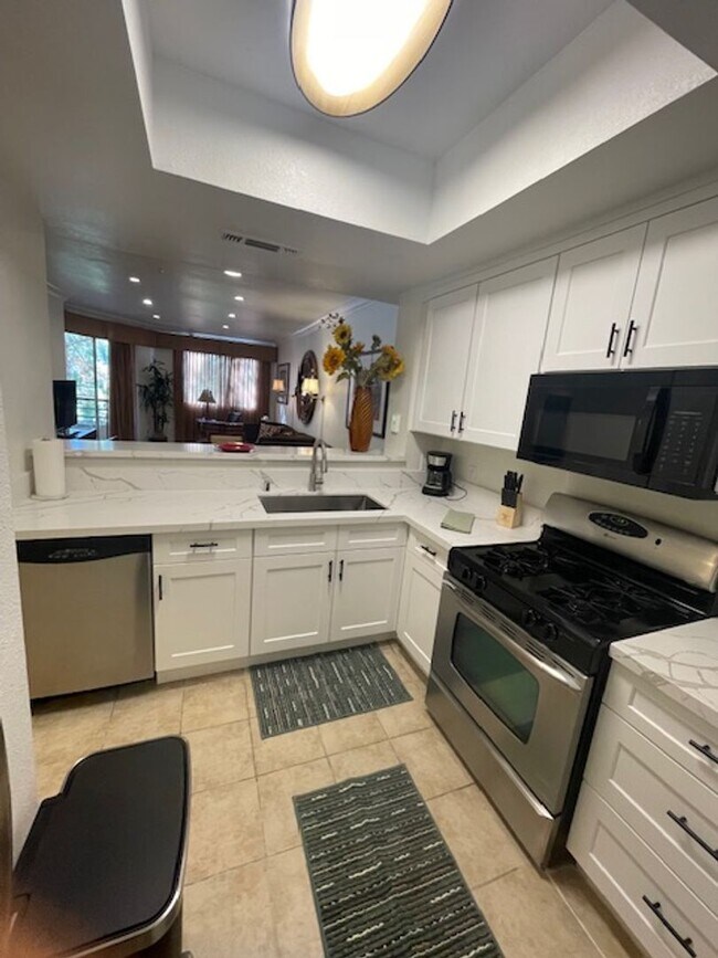 Building Photo - Meridian 2 Bd / 2 Ba with Laminate Flooring in Living Room & Bedroom Areas