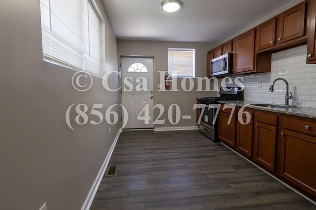 Building Photo - Beautiful 2 Bedroom End Row Home in Liberty Park with Driveway and Shed!