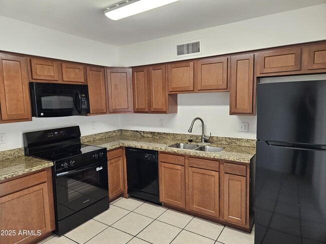 Building Photo - 1221 E Harmony Cir