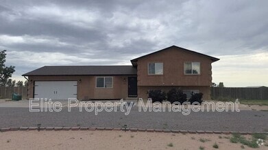 Building Photo - 1150 S Los Charros Dr