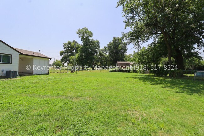 Building Photo - 9344 E 3rd Pl