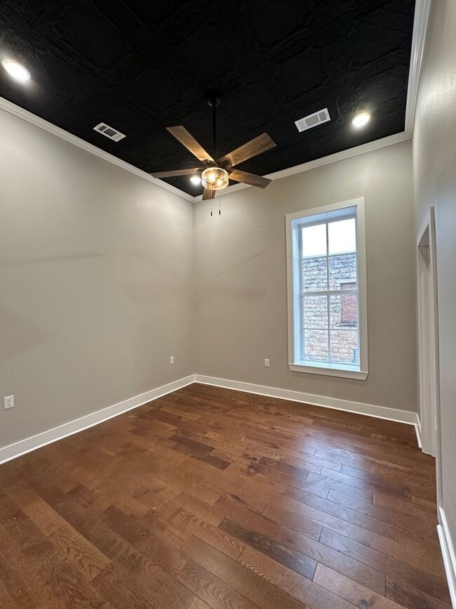 Building Photo - Charming Downtown Apartments