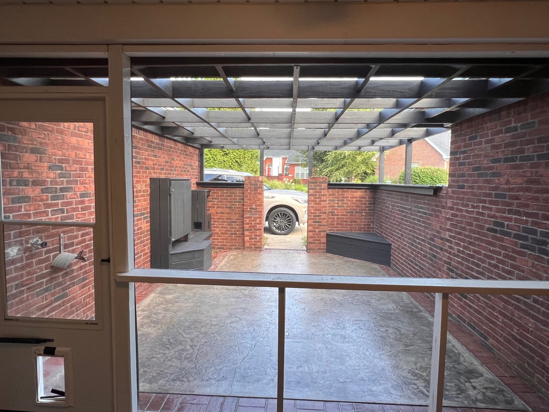 Private pergola-covered, bricked-in patio - 105 Ashton Ct