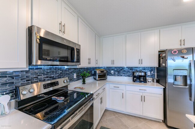 Building Photo - PET FRIENDLY- TURNKEY FURNISHED. VARIABLE RENTAL RATES