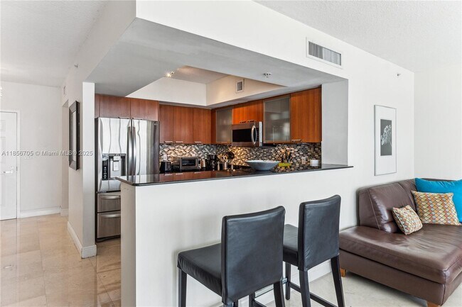 Building Photo - 16699 Collins Ave