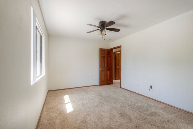 Building Photo - Corner Lot 4BR with Vaulted Ceilings & Big Yard