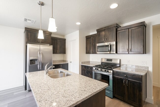 Building Photo - Modern 4-Bed Stand-Alone Home with Fenced Patio