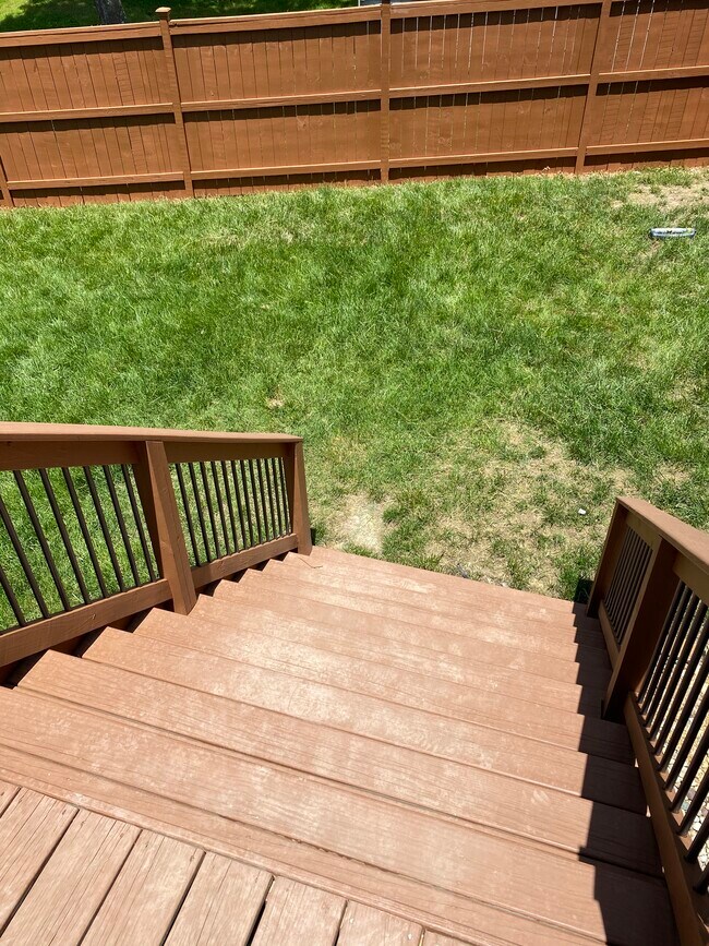 Stairs down to backyard - 709 Warmstone Ct