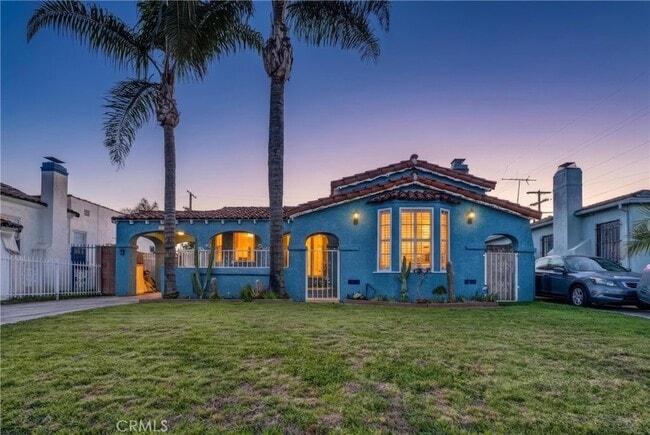 Building Photo - 9807 S Denker Ave