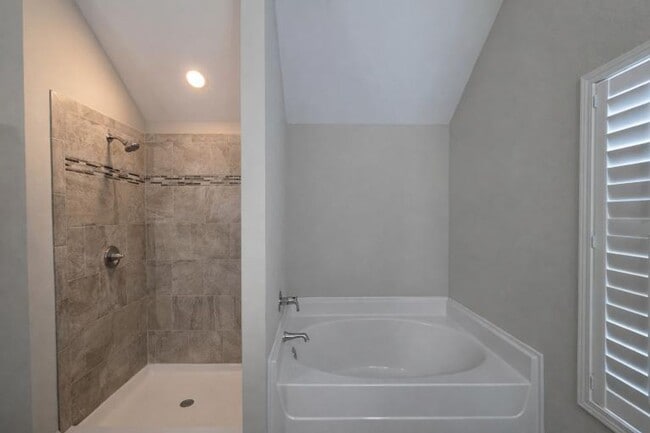 Building Photo - Get ready to fall in love—this sleek, modern beauty in West Creek Farms is bringing the wow facto...