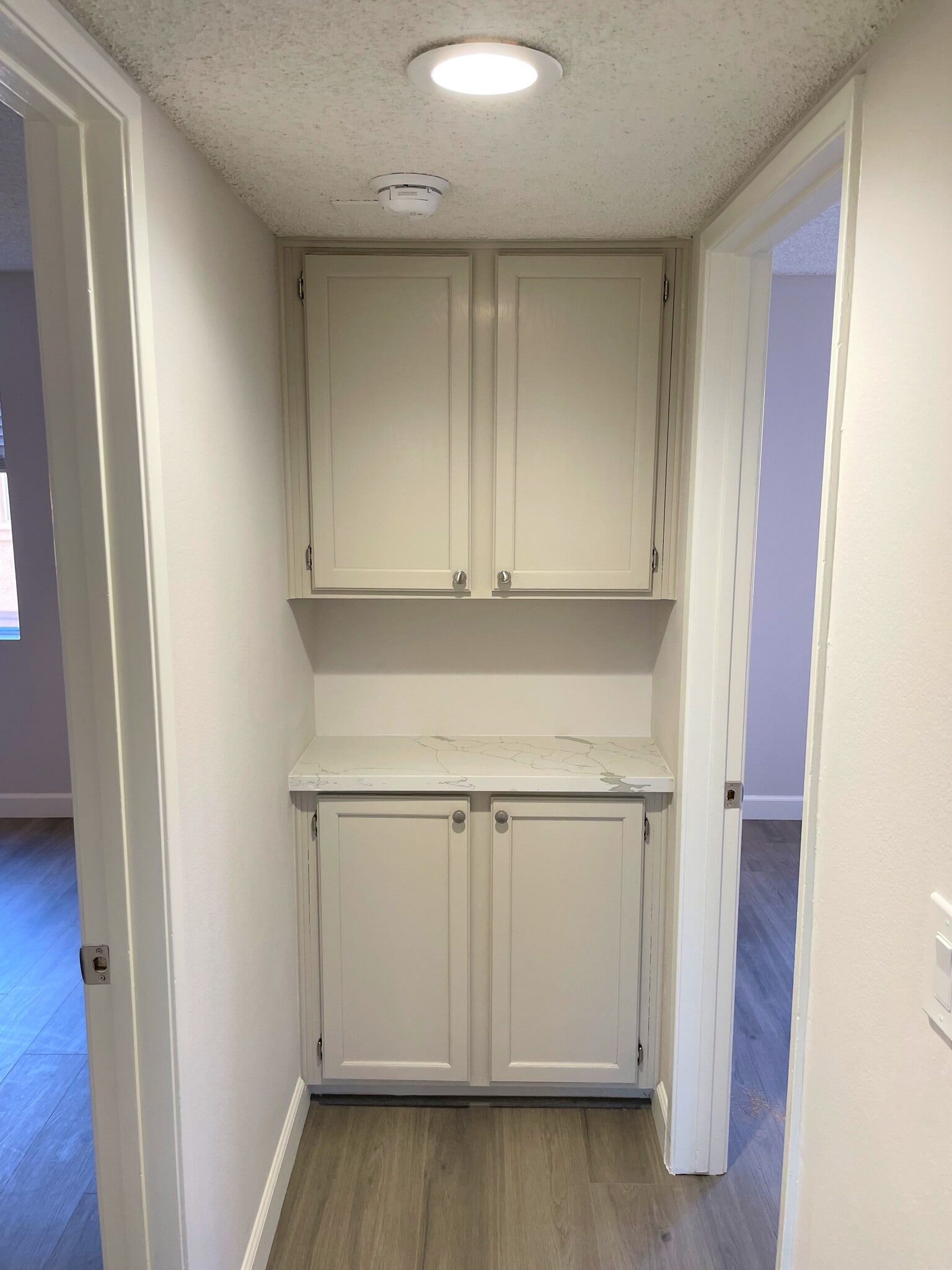 Linen cabinet with quartz counter - 19808 Sandpiper Plz