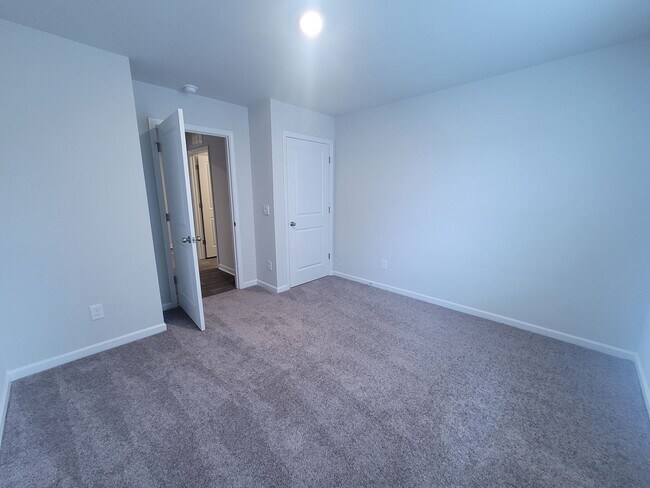 Building Photo - Welcome to our brand new 4-bedroom, 2-bathroom home located in the charming community of Castle H...