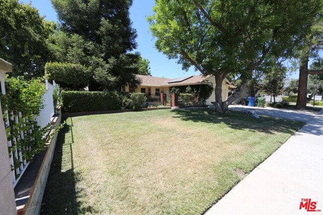 Building Photo - 7309 Asman Ave