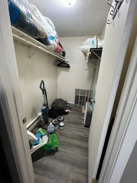 large walk in closet and storage - 3040 Park Ave