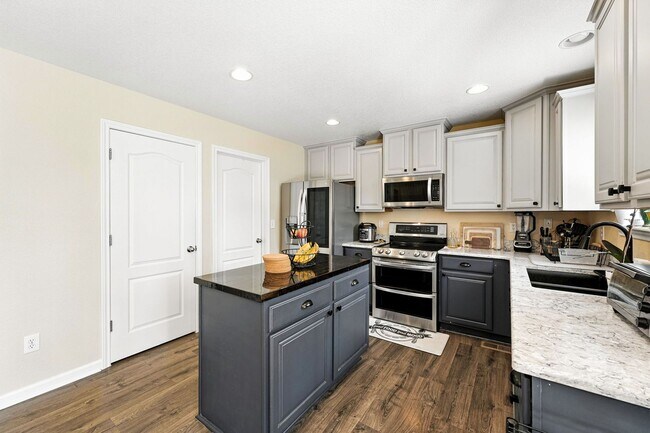 Building Photo - 3 car garage! Across from huge park! Great...